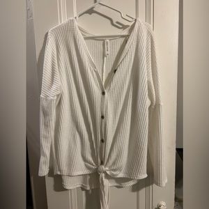 Front tie, button up long sleeve white shirt.